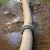 Hollis Hills Sprinkler System Flood by H2O Restoration Corp